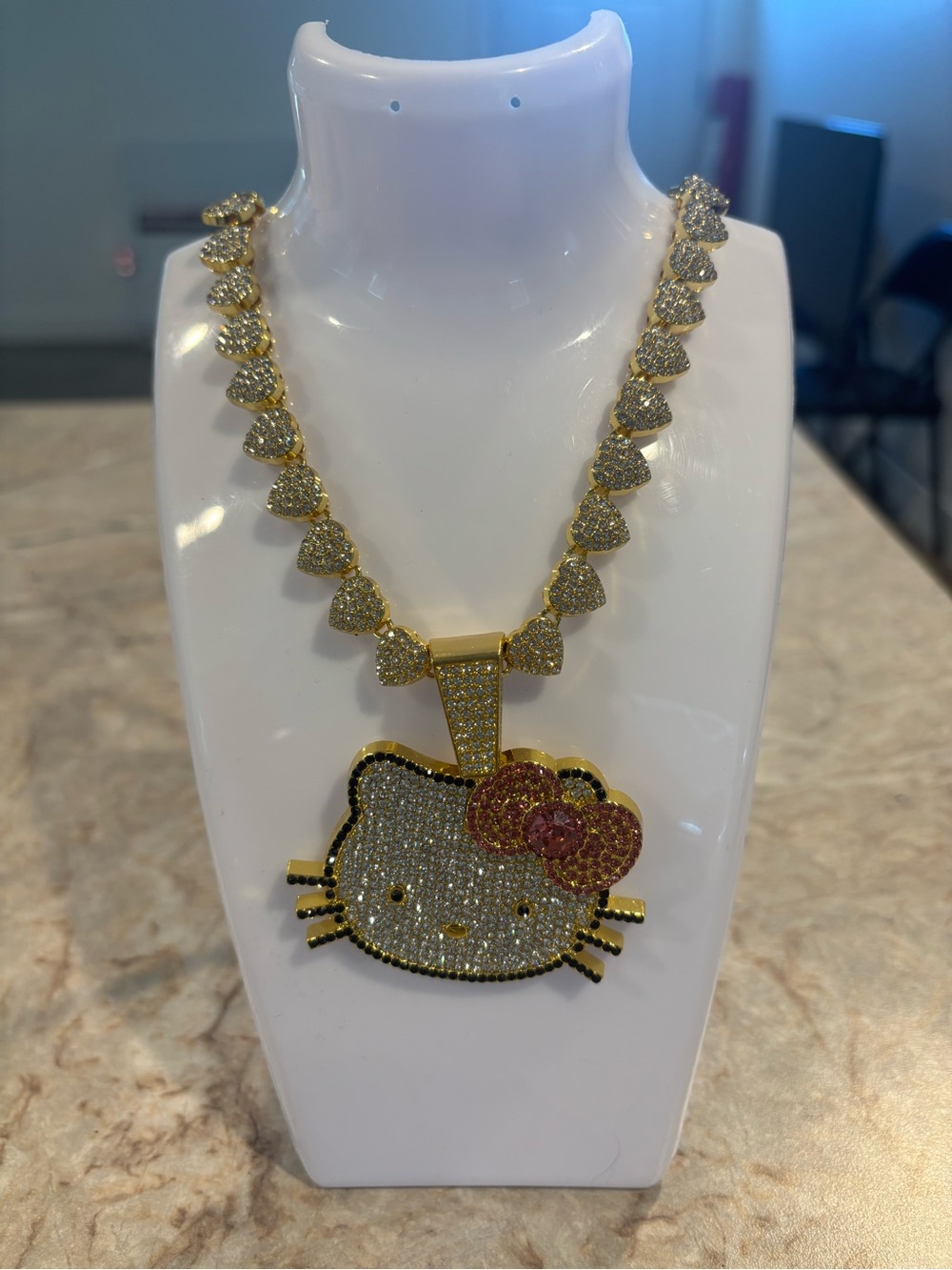 Hello Kitty Gold-Tone Crystal Pendant Necklace - Sparkling Pink Bow